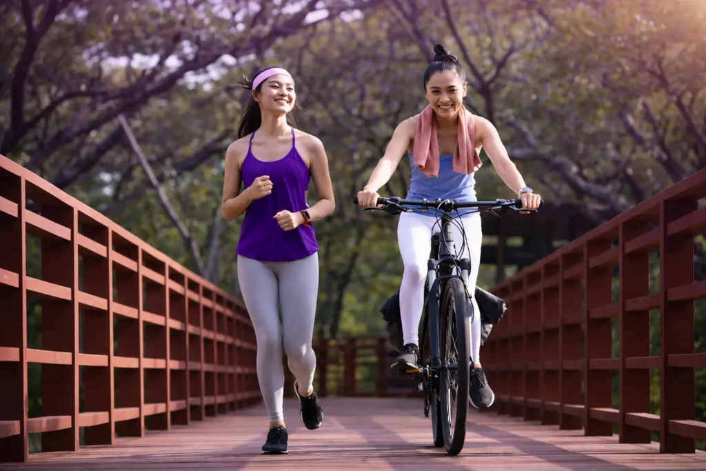 Labiaplasty for active women illustrated by women running and cycling comfortably outdoors