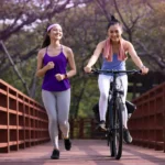 Labiaplasty for active women illustrated by women running and cycling comfortably outdoors